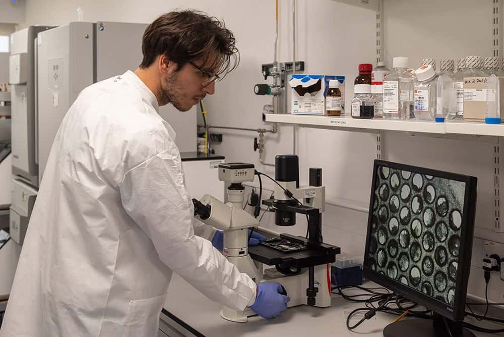 Capturing Innovation: Photography for Research Companies 3 High-quality corporate scientist working in laboratory for professional photography.