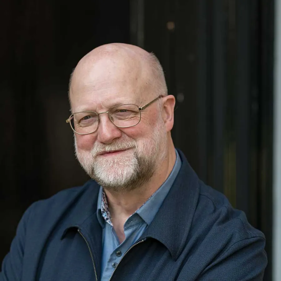 Founder portrait of Bill in natural light by Jean-Luc Benazet, Cambridge branding photographer.