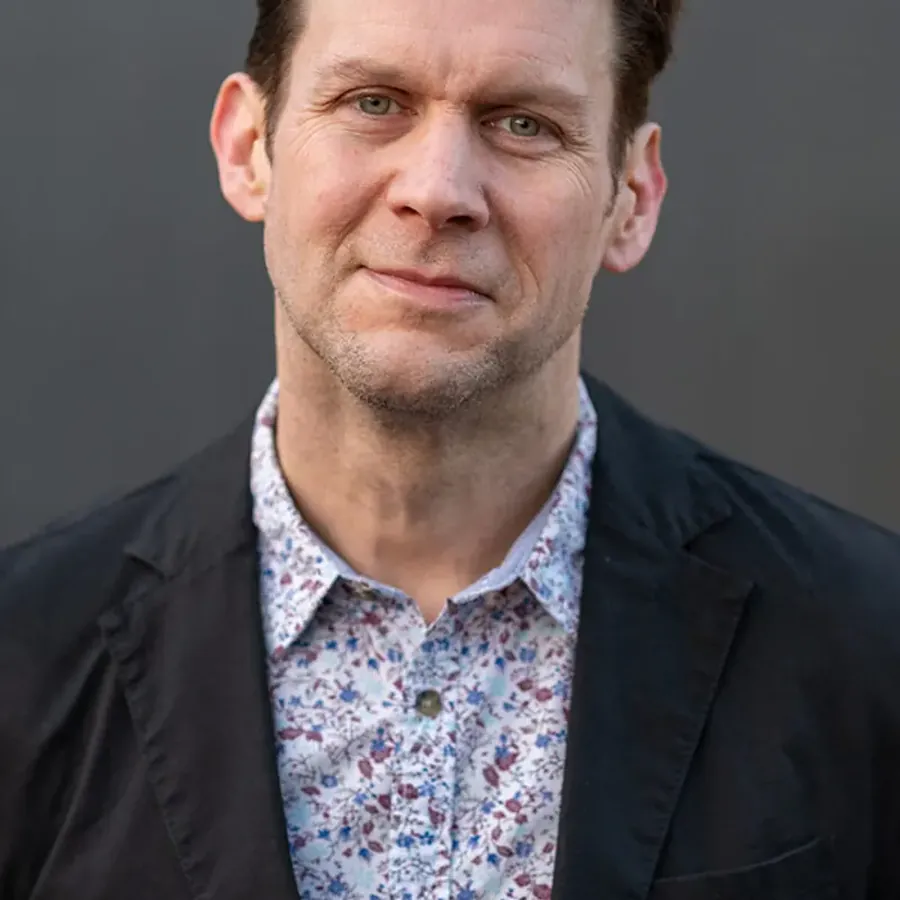 Founder portrait in natural light by Jean-Luc Benazet, Cambridge branding photographer.